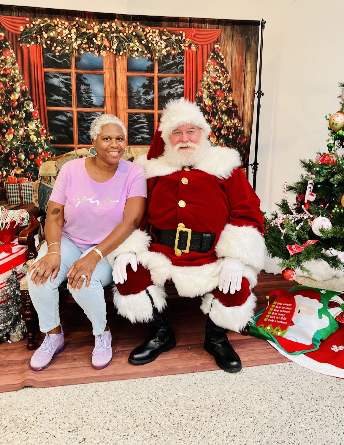 Brookshire celebrated its Christmas Festival Dec. 3. The festival featured a performance by the Earl Sanders Jr. Band and a visit from Santa Claus, who is pictured here visiting with Sherrel Rogers.